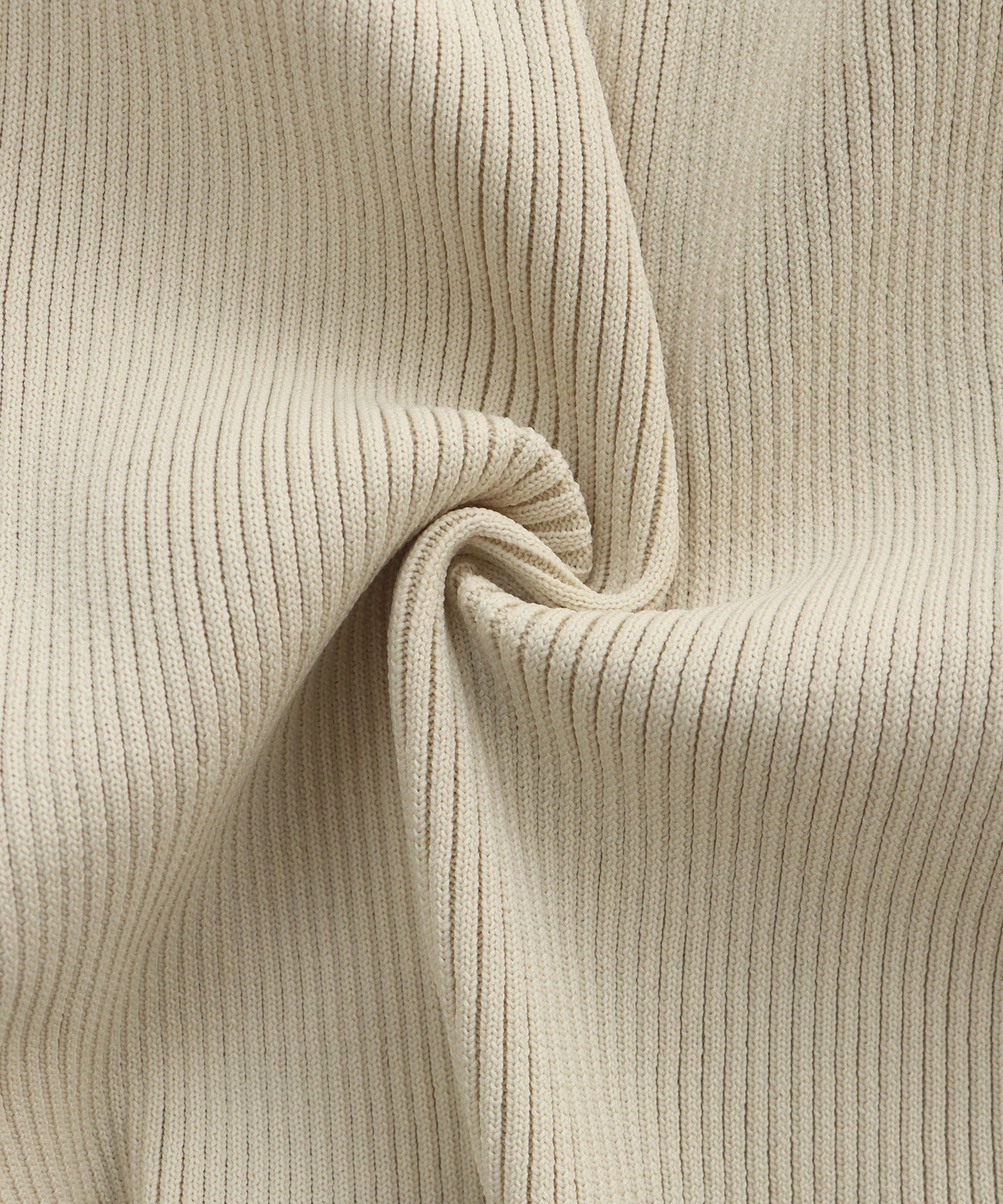 スキッパーペプラムニット