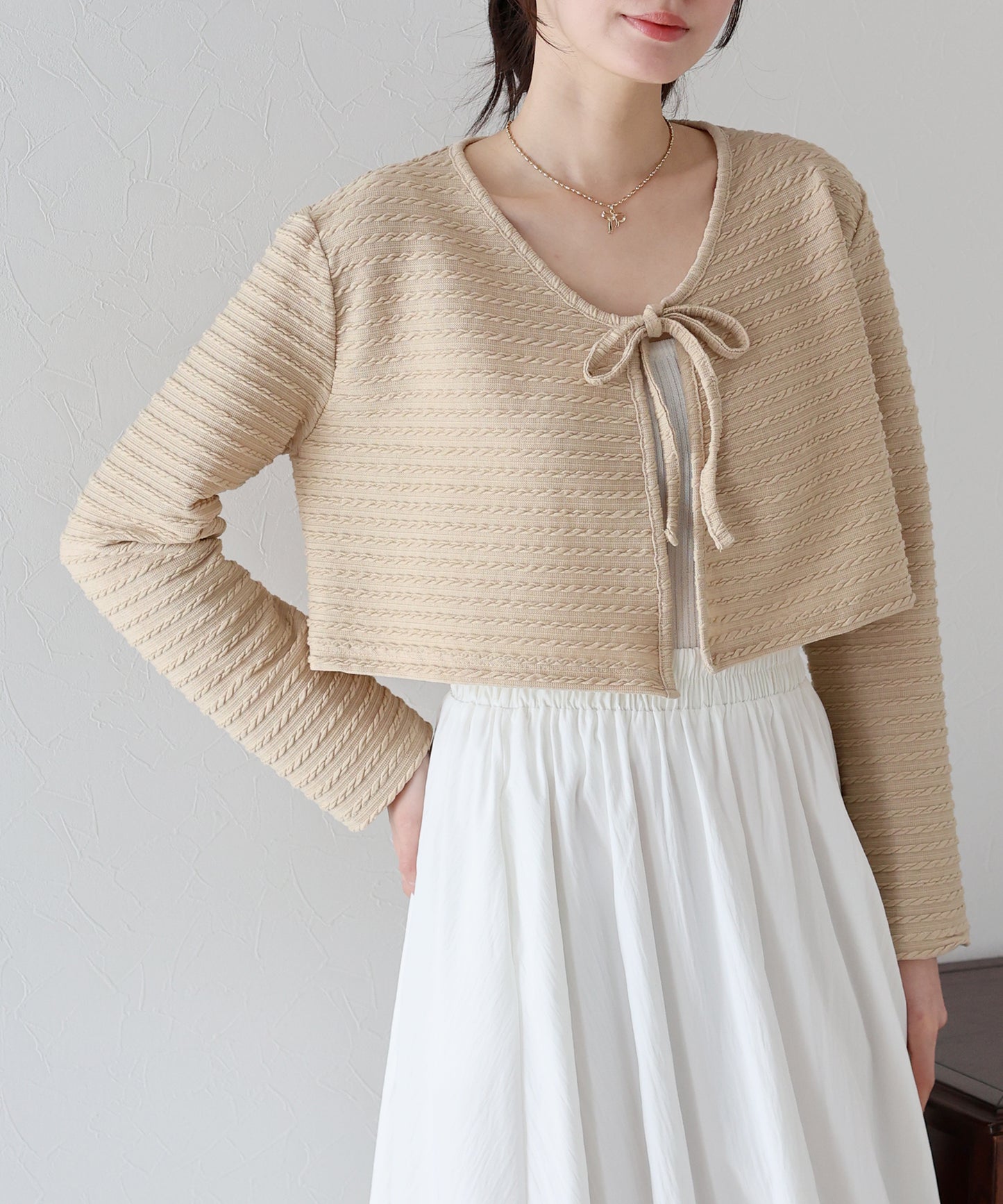 케이블 무늬 리본 가디건