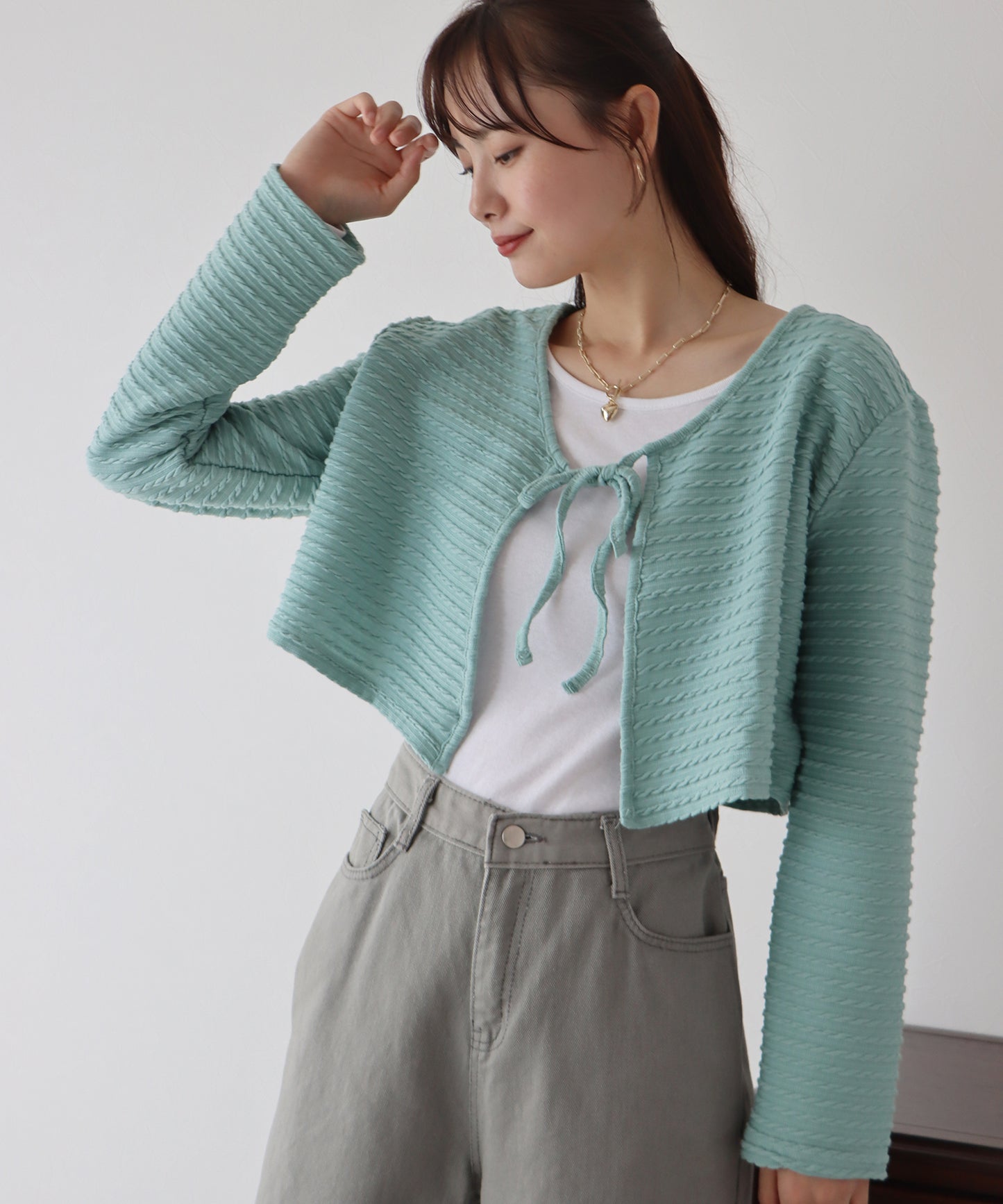 케이블 무늬 리본 가디건