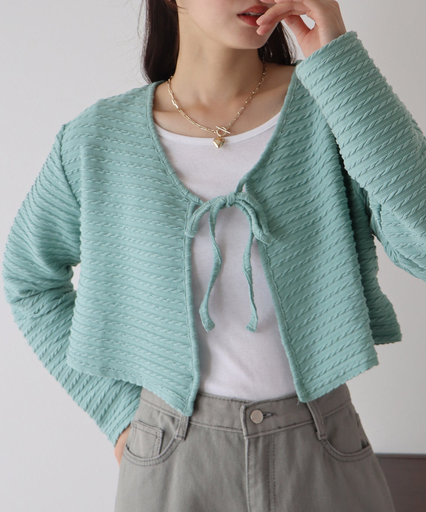 케이블 무늬 리본 가디건