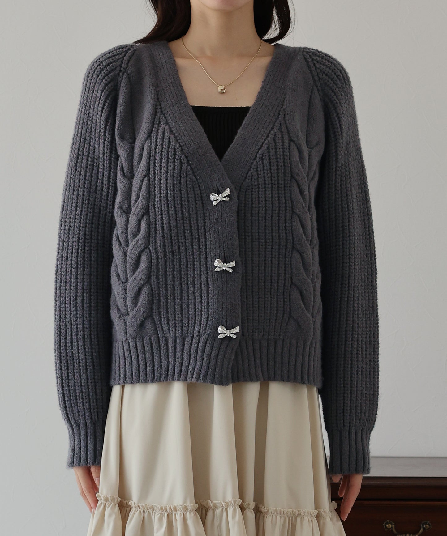 ビジューリボンボタンカーディガン