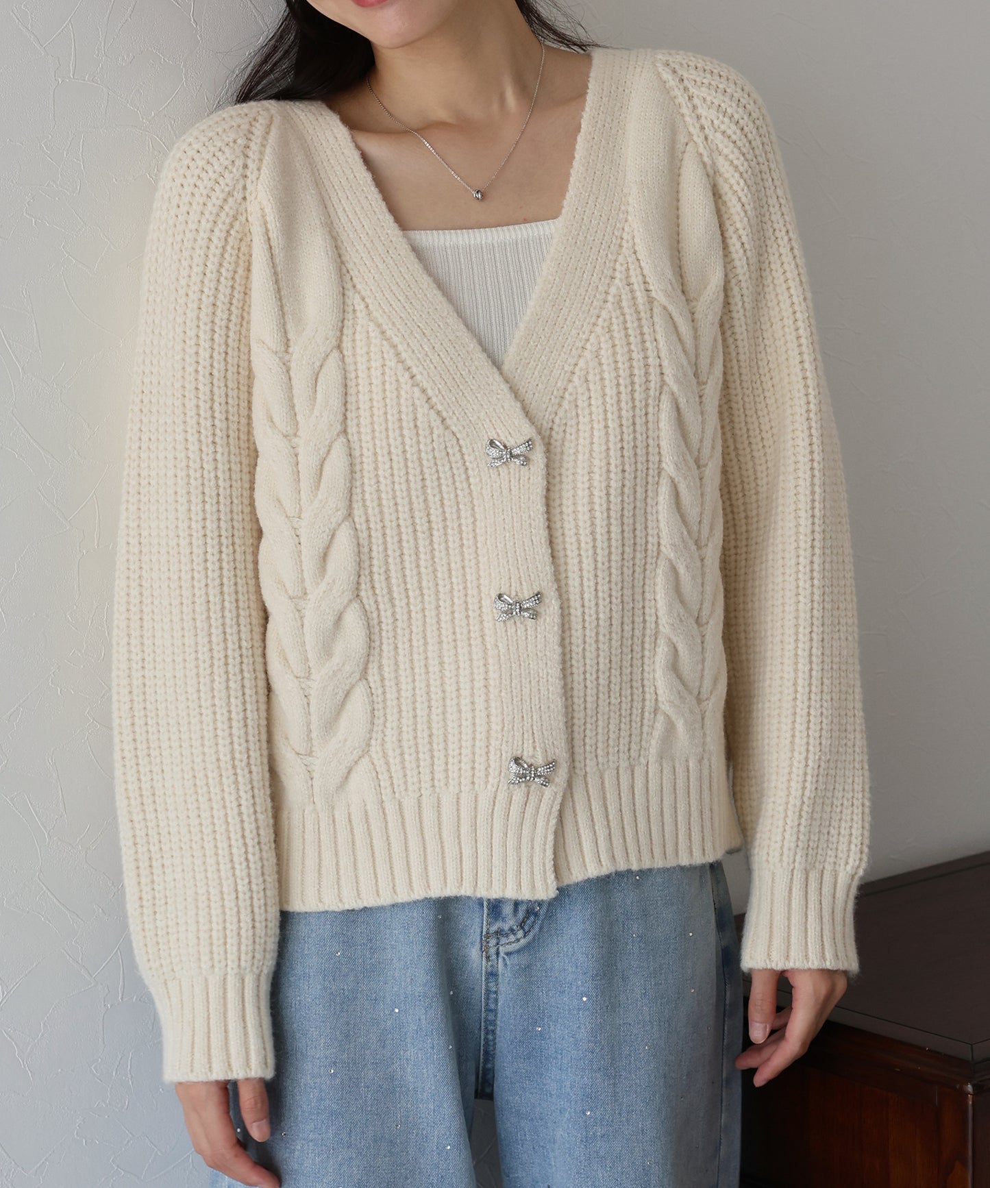 ビジューリボンボタンカーディガン