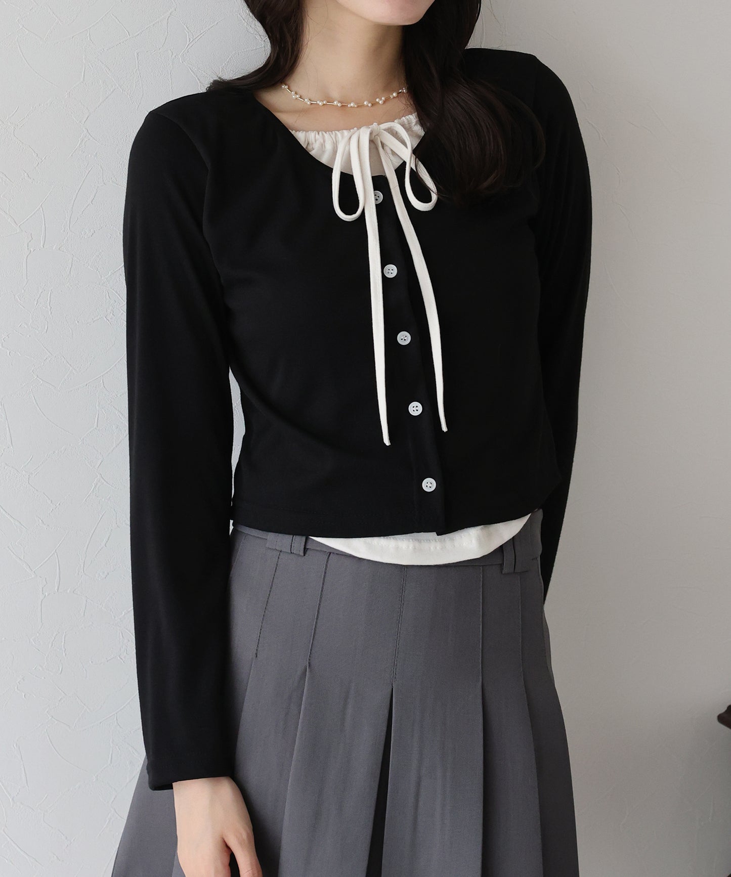 リボン付きレイヤード風トップス