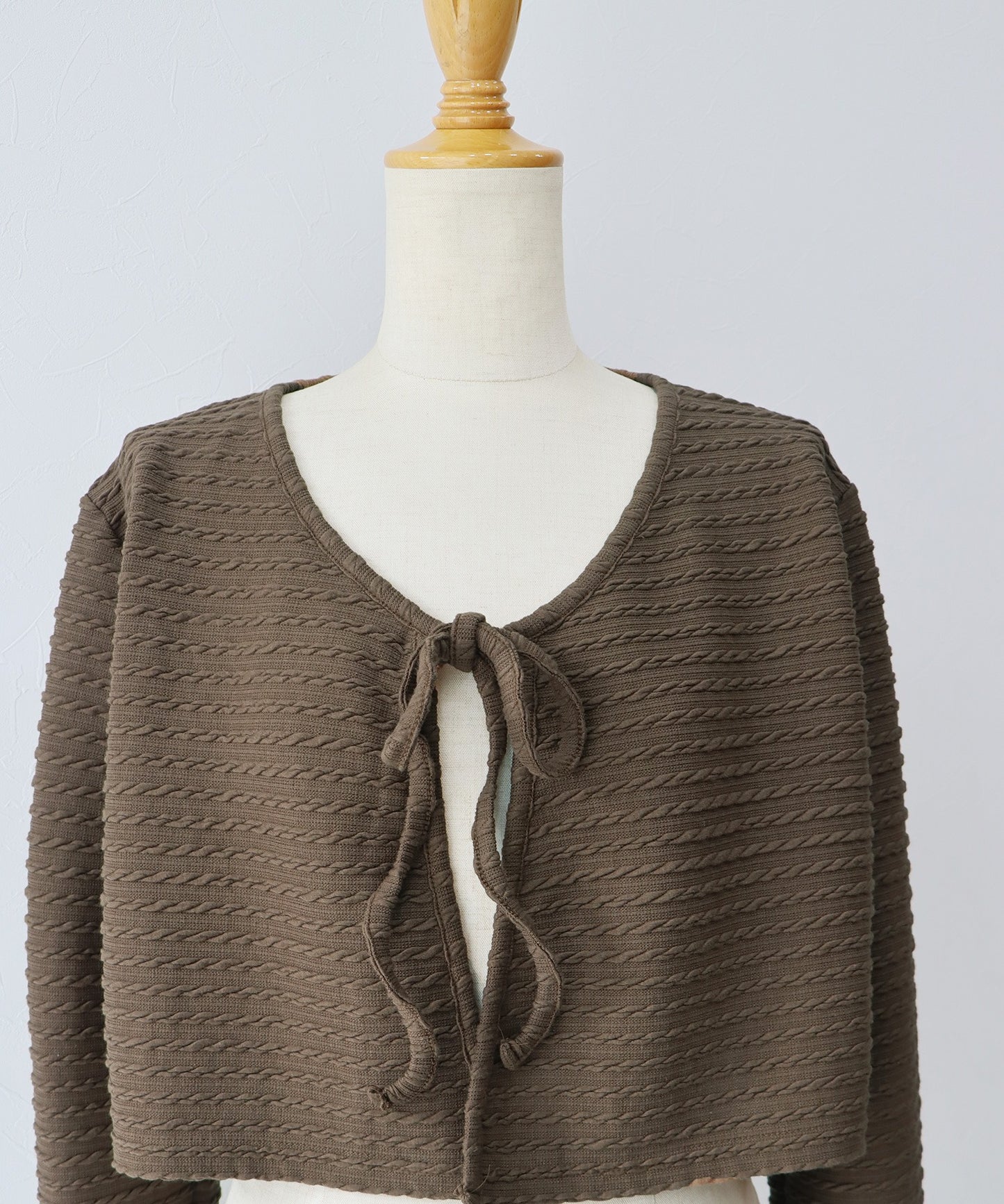 케이블 무늬 리본 가디건