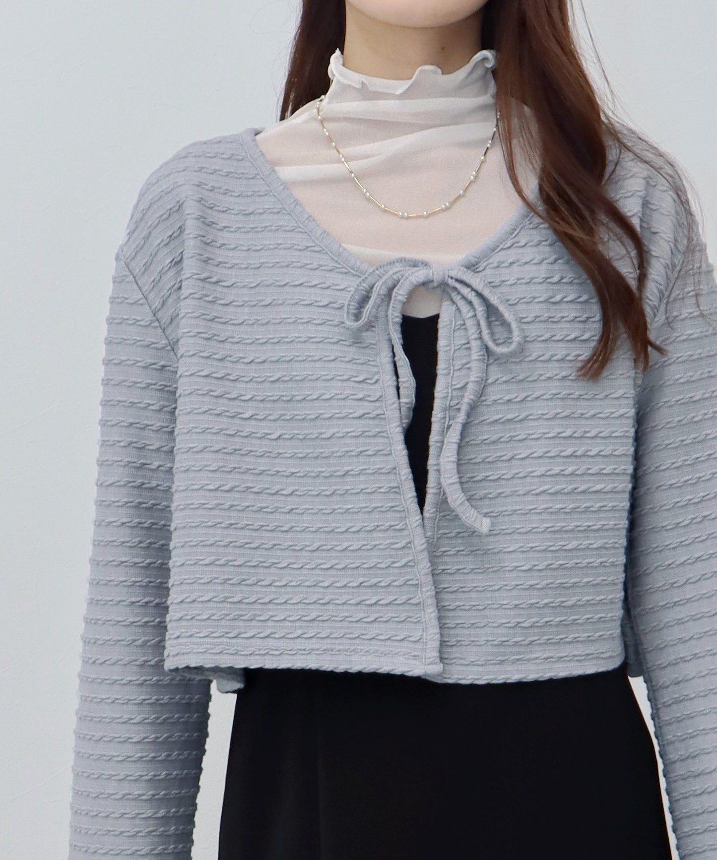 케이블 무늬 리본 가디건