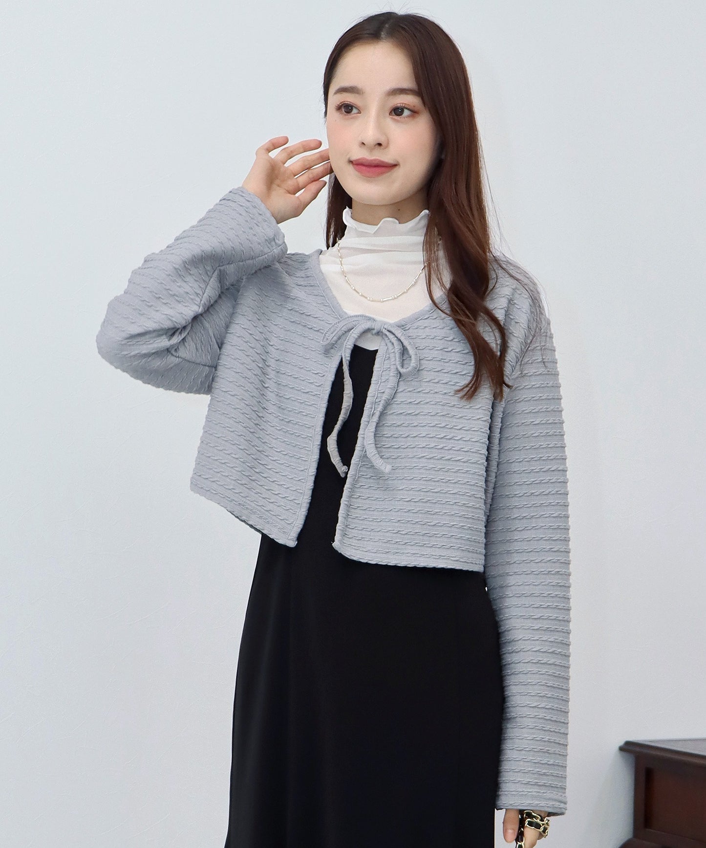 케이블 무늬 리본 가디건