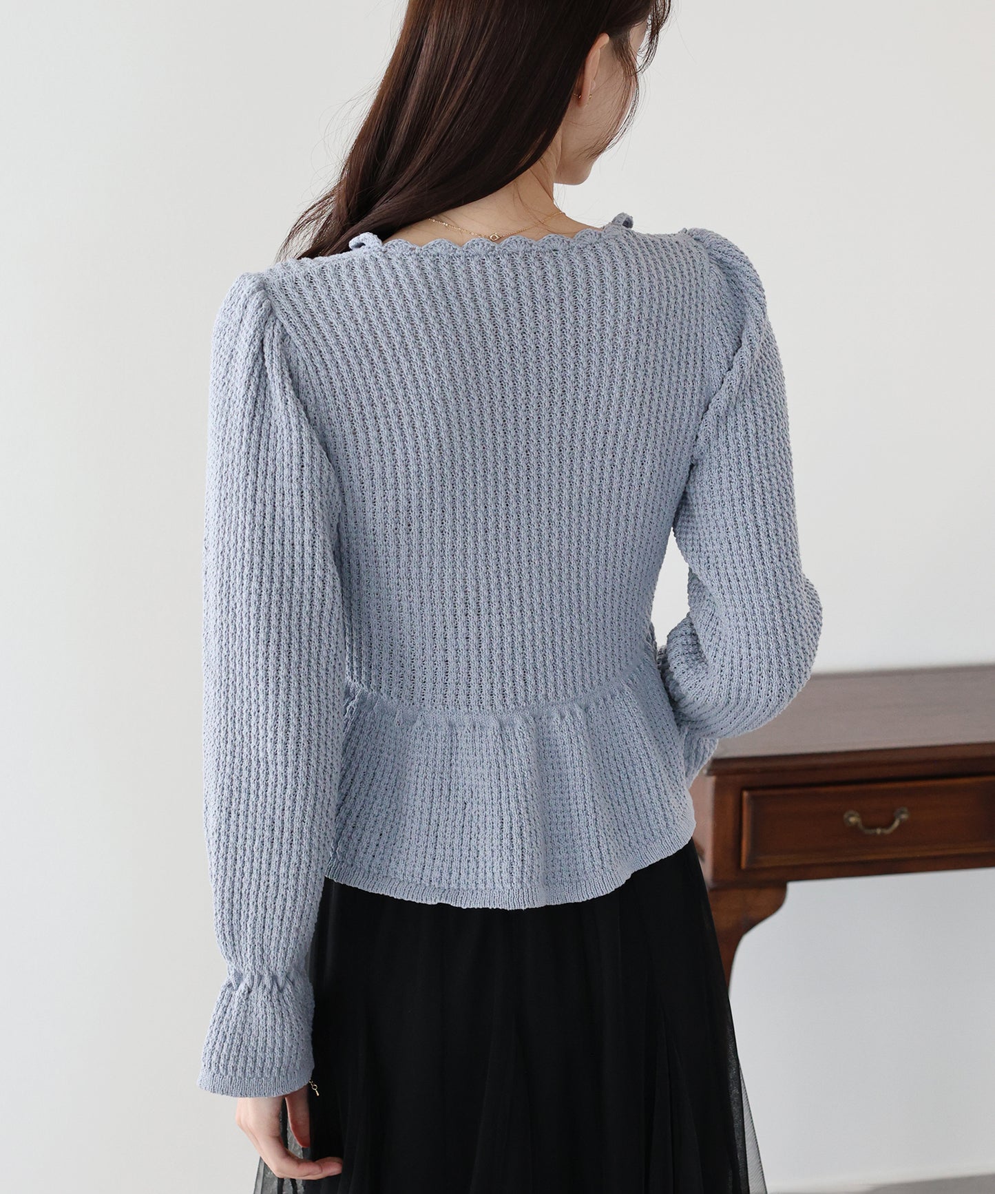 パールボタンペプラムニット