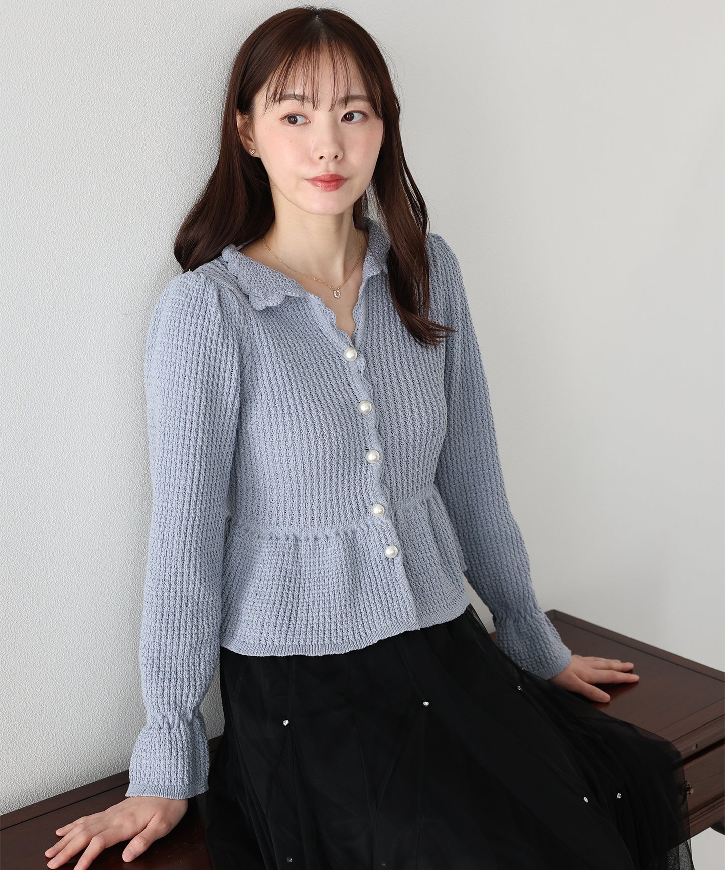 パールボタンペプラムニット