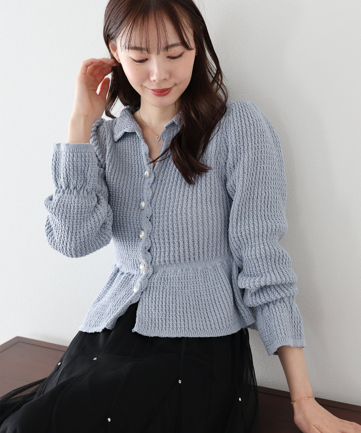 パールボタンペプラムニット
