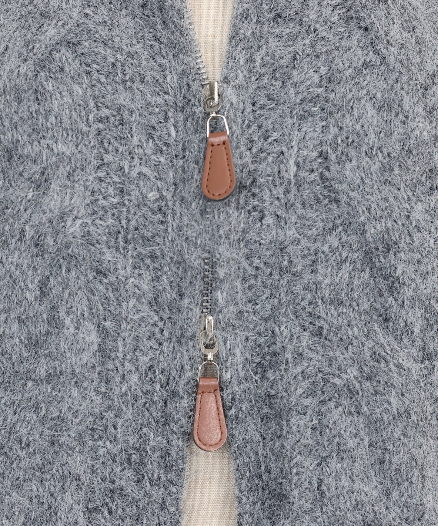 ケーブルダブルジップニット