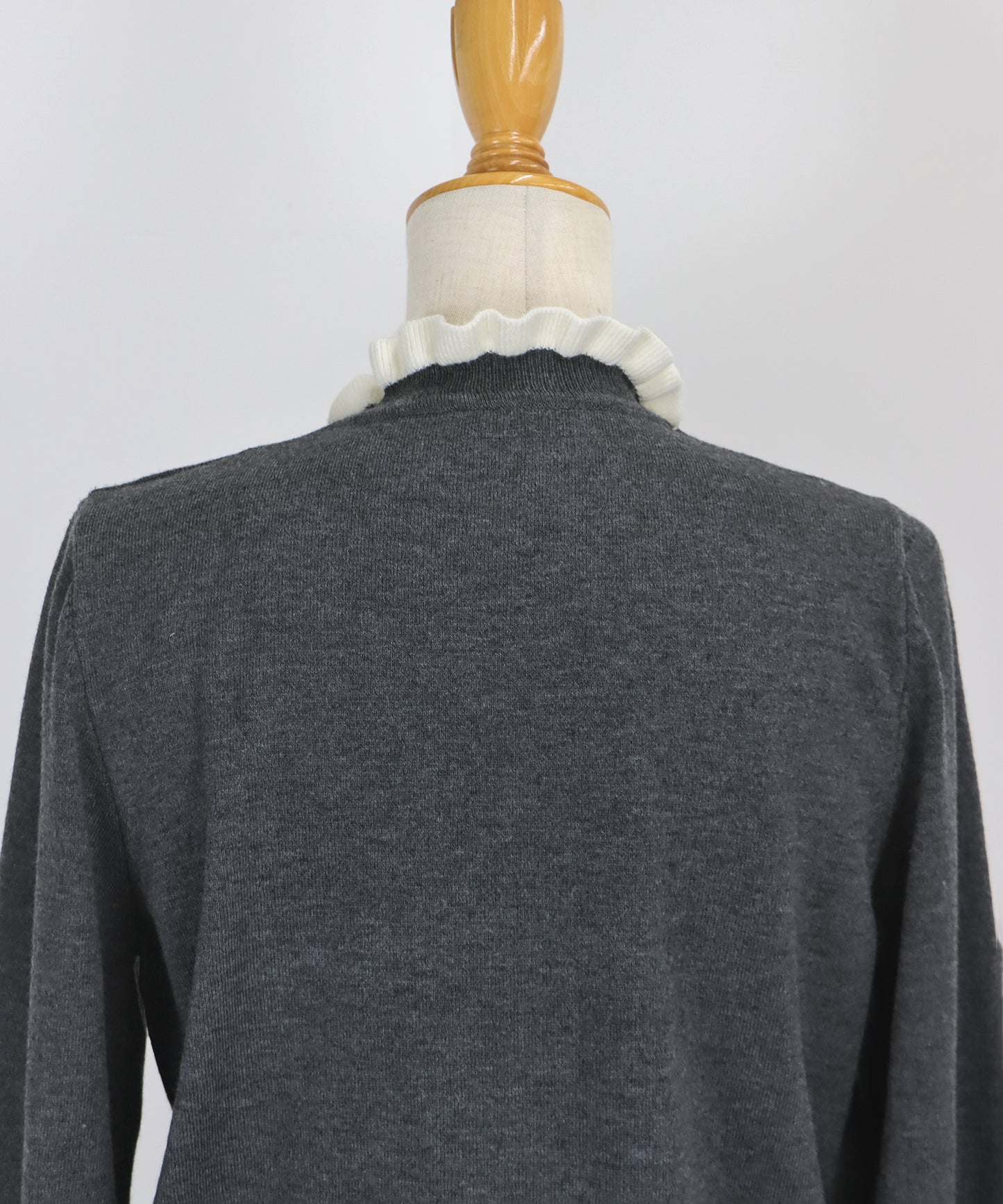 配色フリルハイネックニット