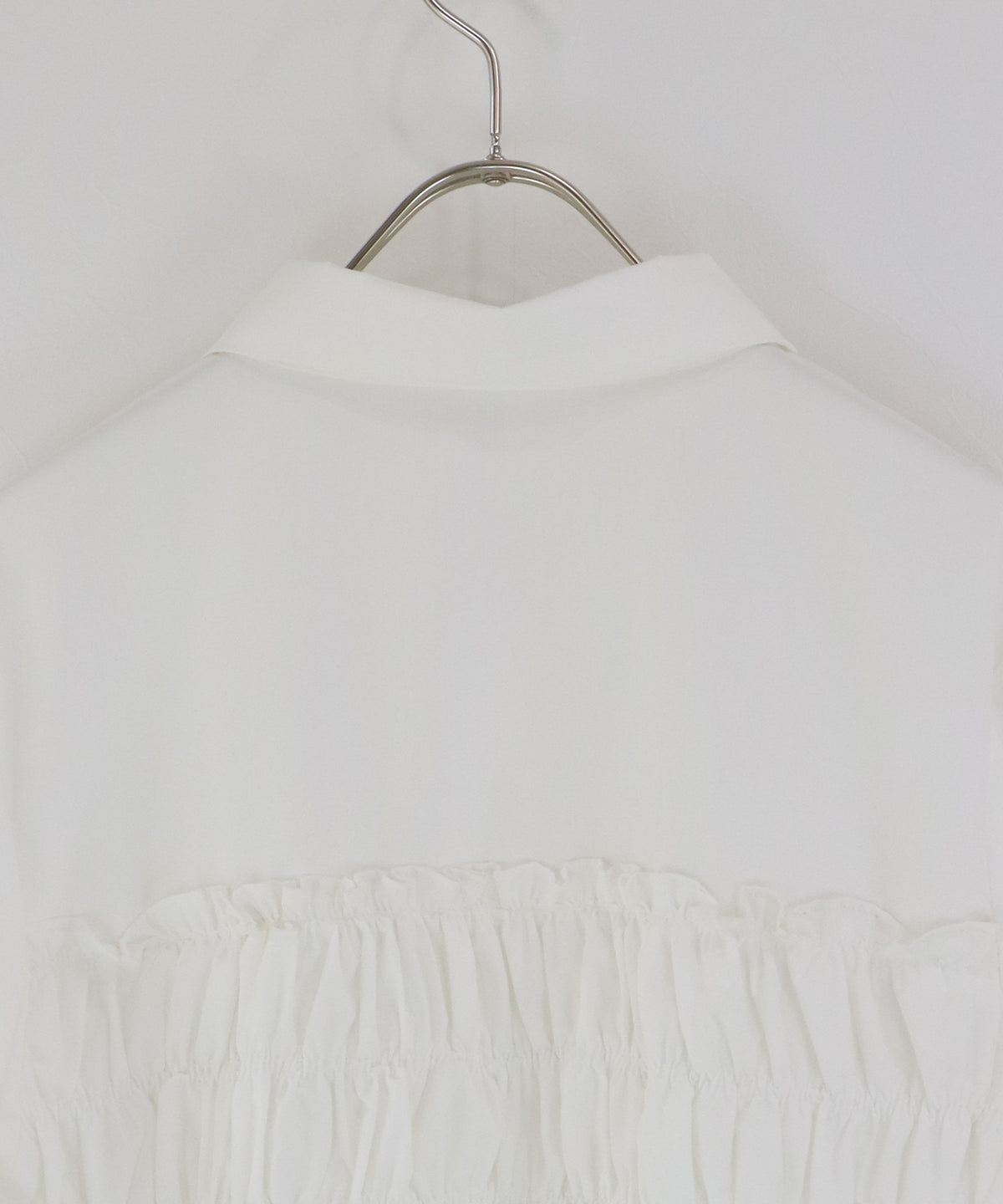 ペプラムシャーリングシャツ