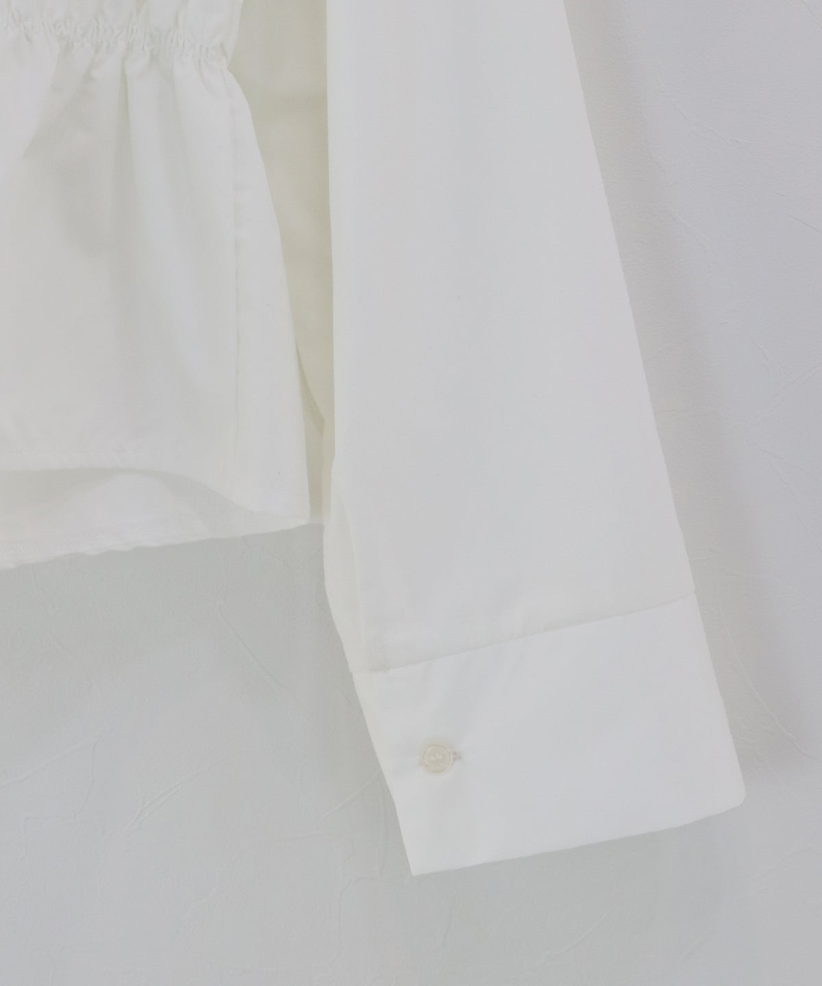 ペプラムシャーリングシャツ