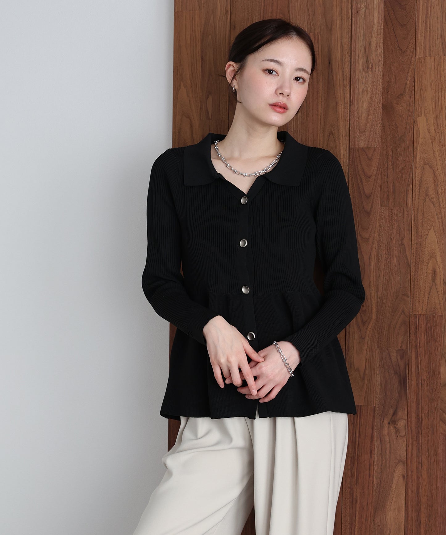 スキッパーペプラムニット