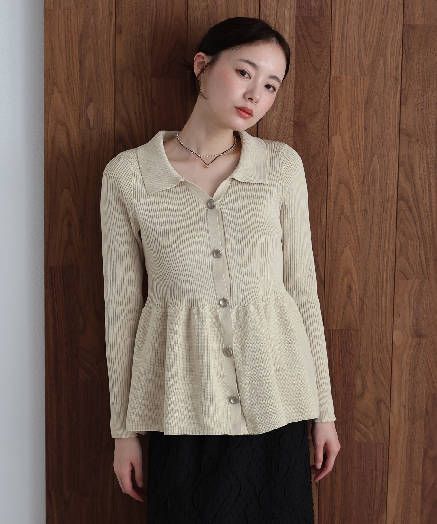 スキッパーペプラムニット