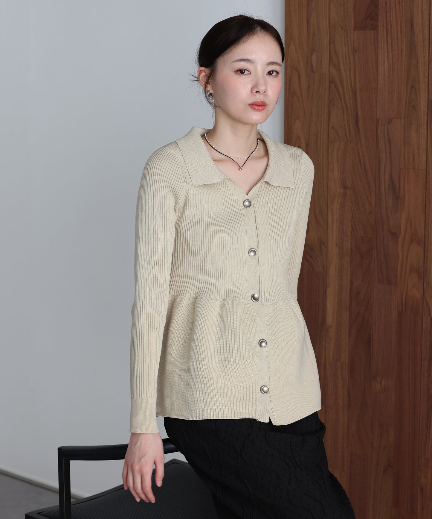 スキッパーペプラムニット