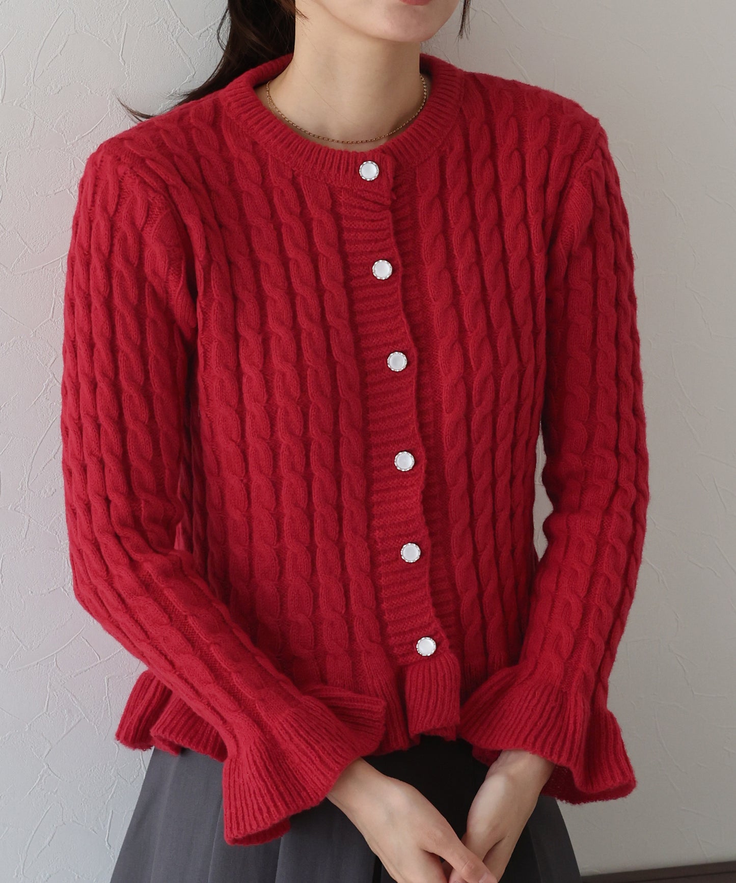 ケーブルペプラムカーディガン