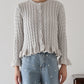 ケーブルペプラムカーディガン