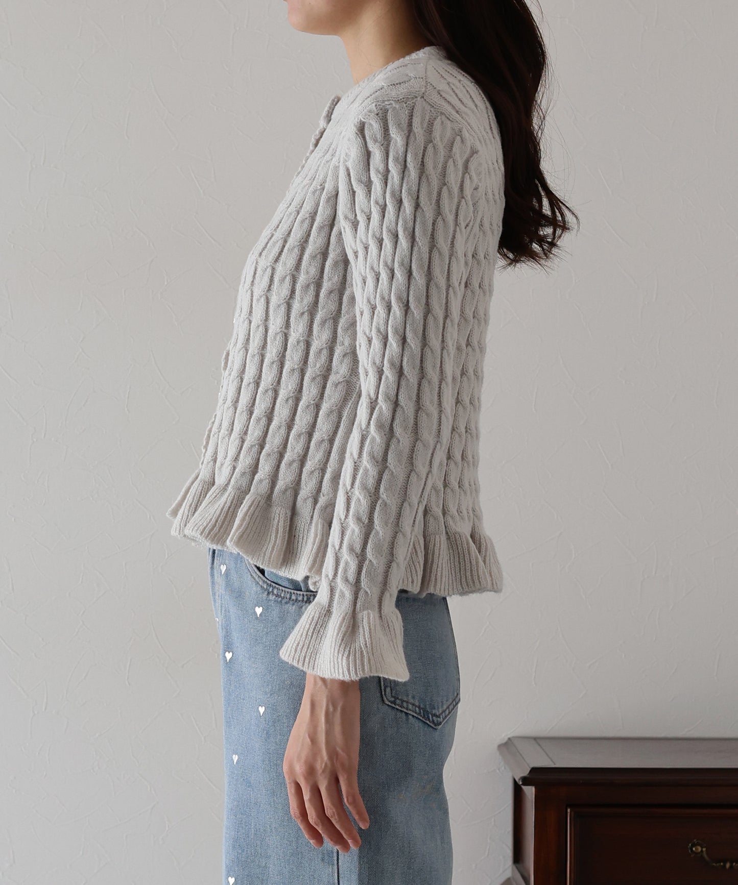 ケーブルペプラムカーディガン