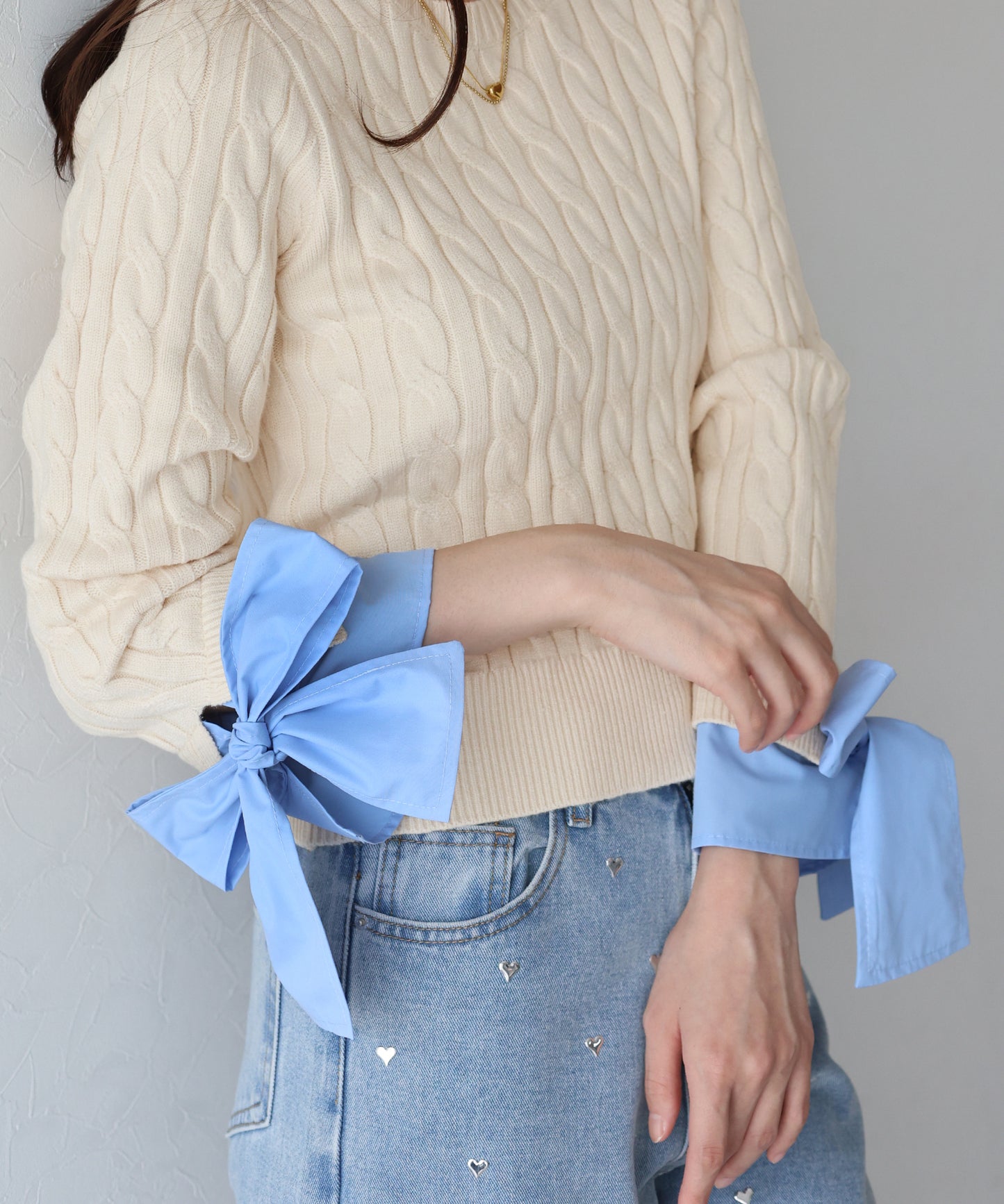 【早割5％OFF】リボン袖ドッキングケーブルニット