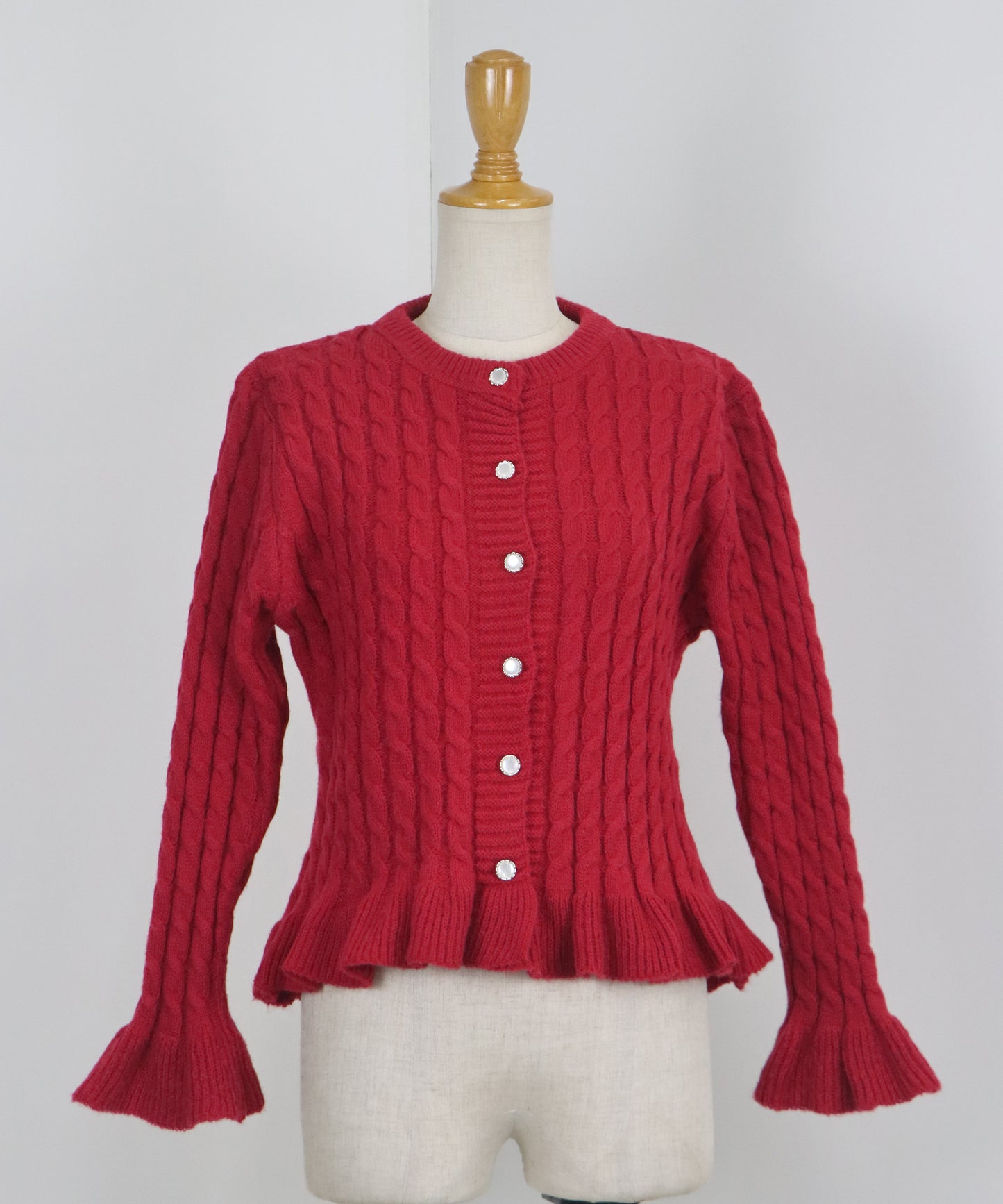 ケーブルペプラムカーディガン