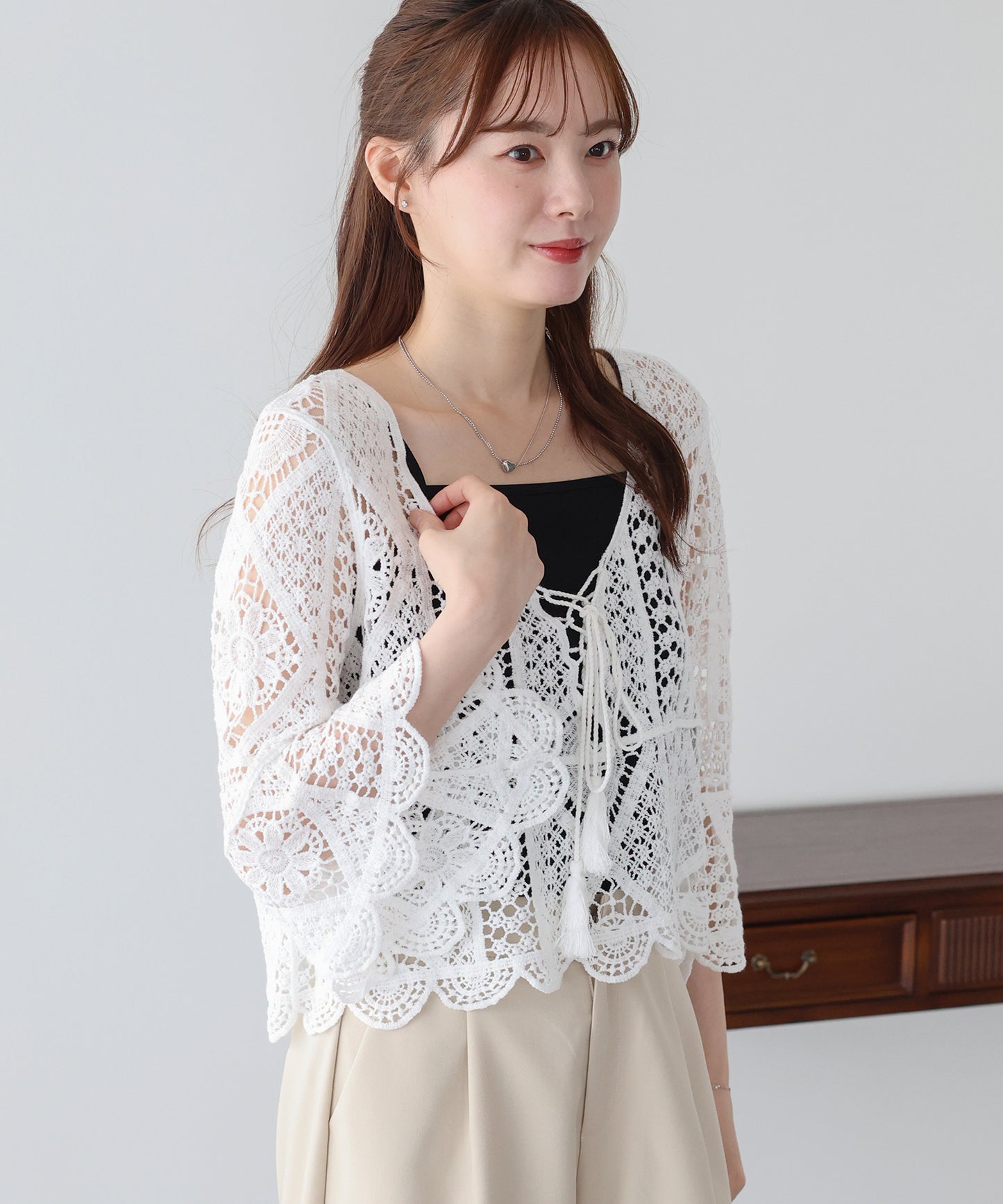 【早割5％OFF】タッセルリボンクロシェニットトップス