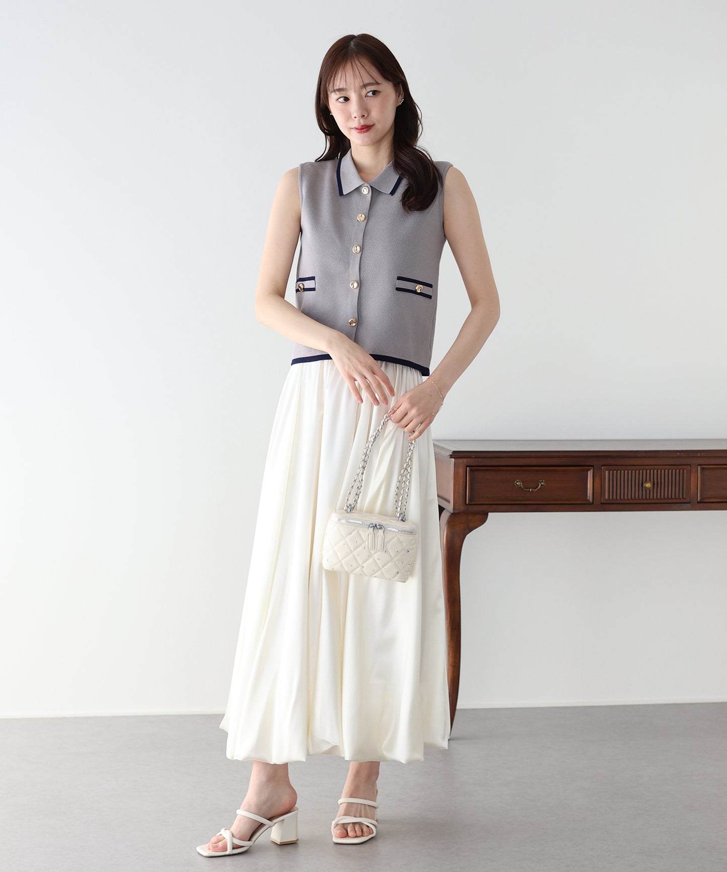 【早割5％OFF】ゴールドボタンノースリーブポロニット