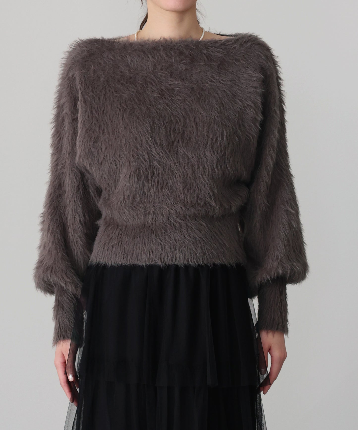 オフショルシャギーニット